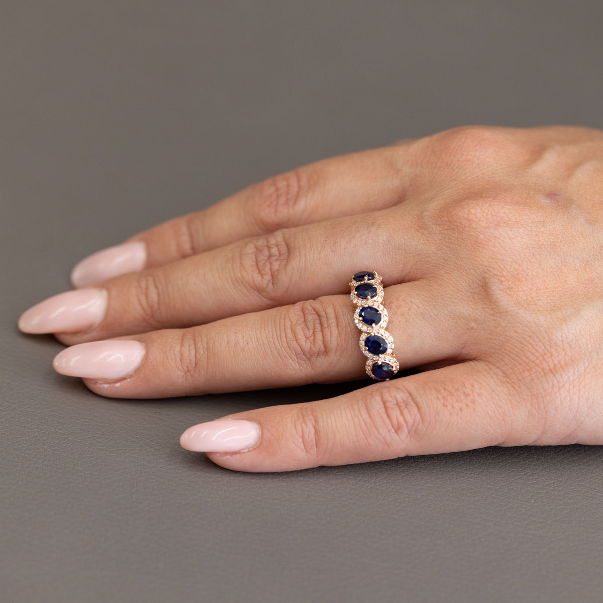 18kt Rose Gold Veretta Ring with Oval Cut Sapphires and Diamonds