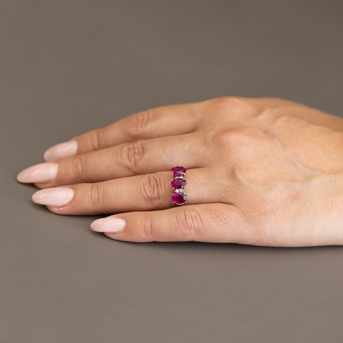 18kt White Gold Trilogy Ring with Oval Cut Rubies and Diamonds