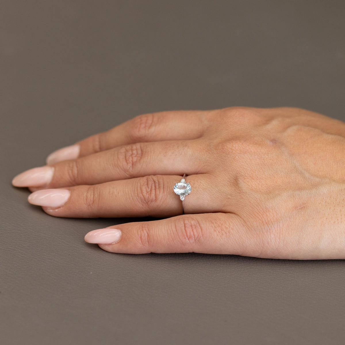18kt White Gold Ring with Oval Cut Aquamarine and Diamonds