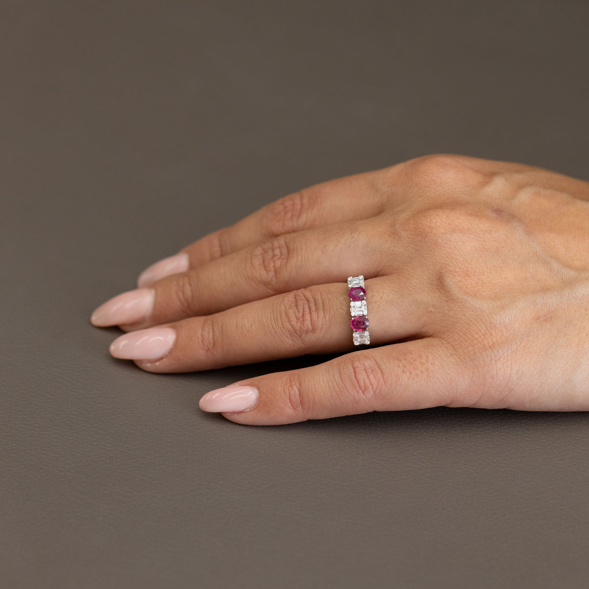 18kt White Gold Ring with Oval Cut Rubies and Baguette Cut Diamonds