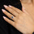 Anello Oro Bianco 18 kt con Zaffiro Ovale e Contorno in Diamanti