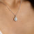 Collana in Oro Bianco 18 kt con Ciondolo Forma Goccia in Pavè di Diamanti e diamante centrale