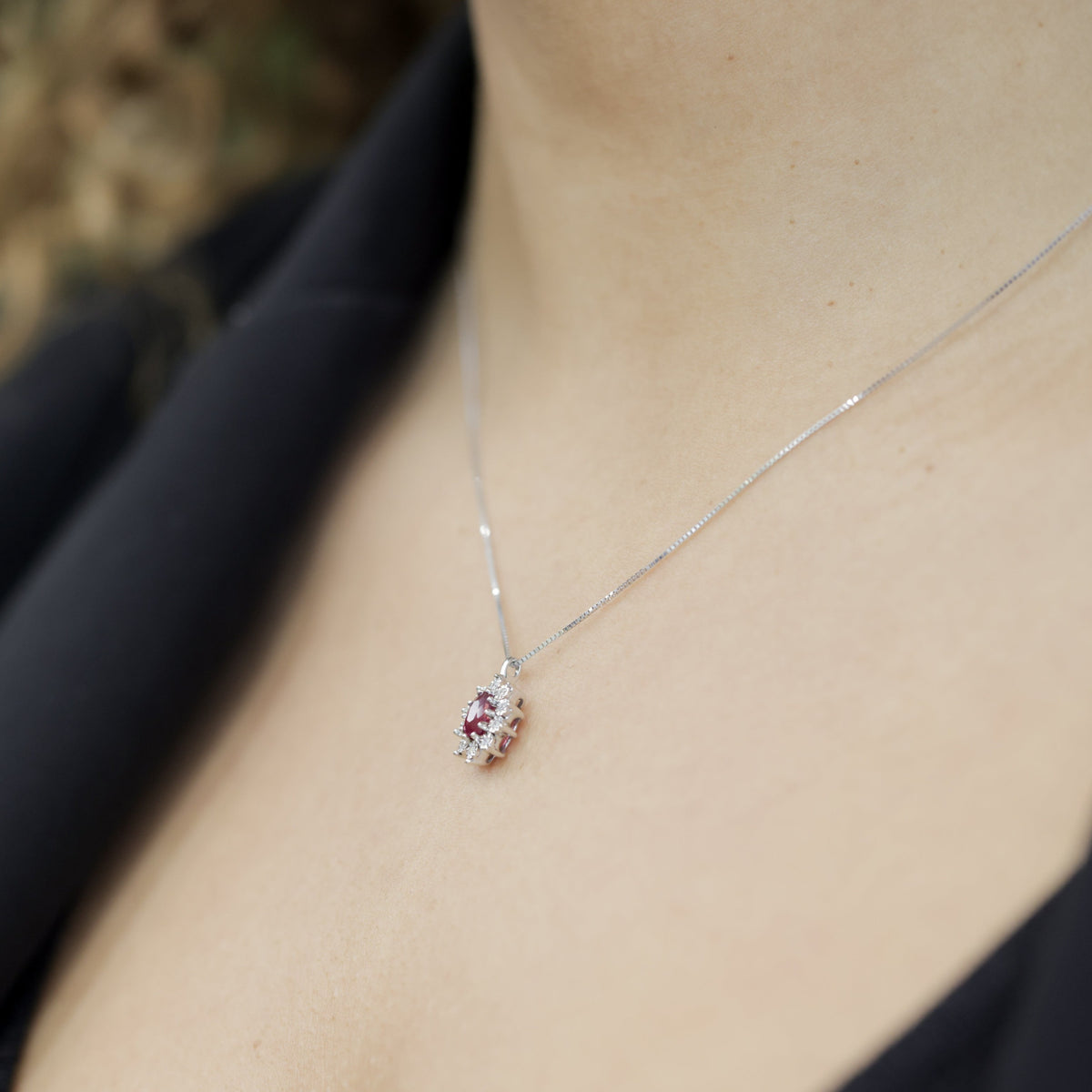 Pendant with central Ruby and Diamonds in a Star setting
