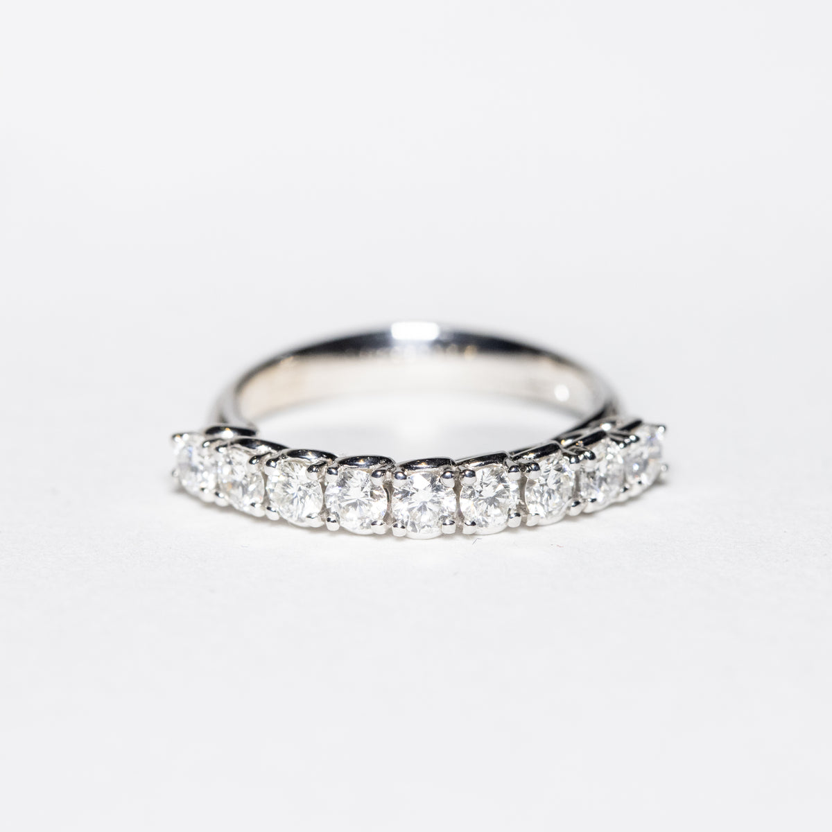 18Kt White Gold Veretta Ring with 9 Round Brilliant Cut Diamonds