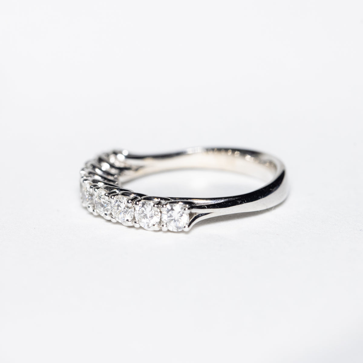 18Kt White Gold Veretta Ring with 9 Round Brilliant Cut Diamonds