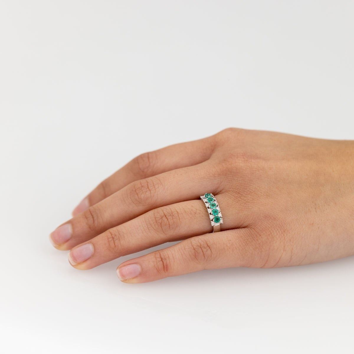 18kt White Gold Veretta Ring with Emeralds and Diamonds