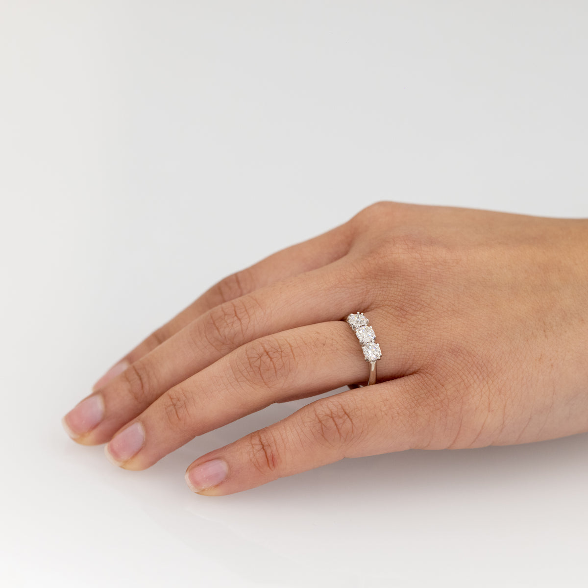 18KT White Gold Trilogy Ring With Round Brilliant Cut Diamonds