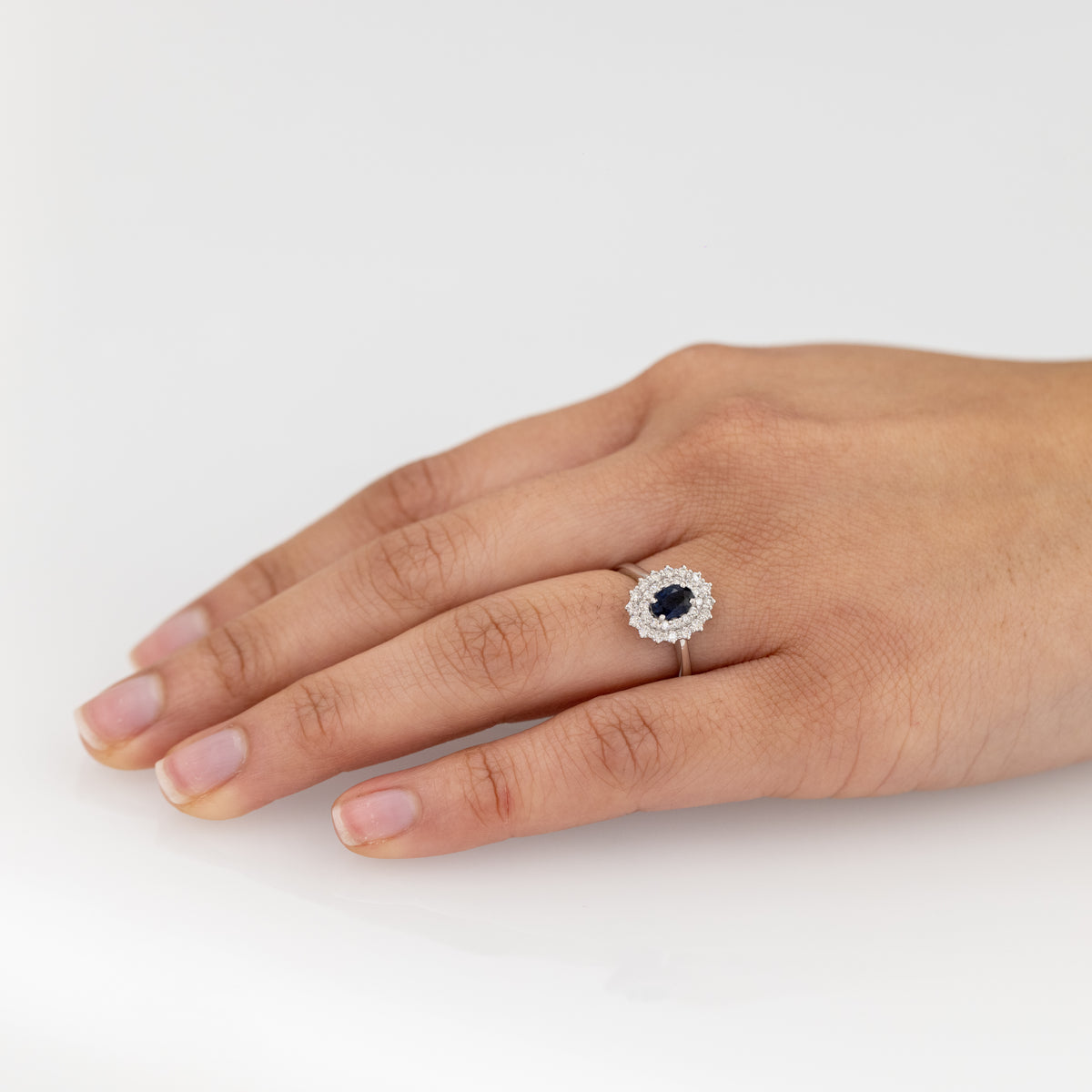 18KT White Gold Ring With Sapphire and Double Row of Diamonds