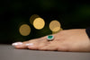 Anello in Oro Bianco 18KT con Smeraldo da 1,90 carati e contorno in Diamanti