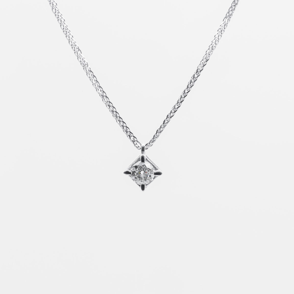 0.20ct diamond point light necklace in 18kt white gold