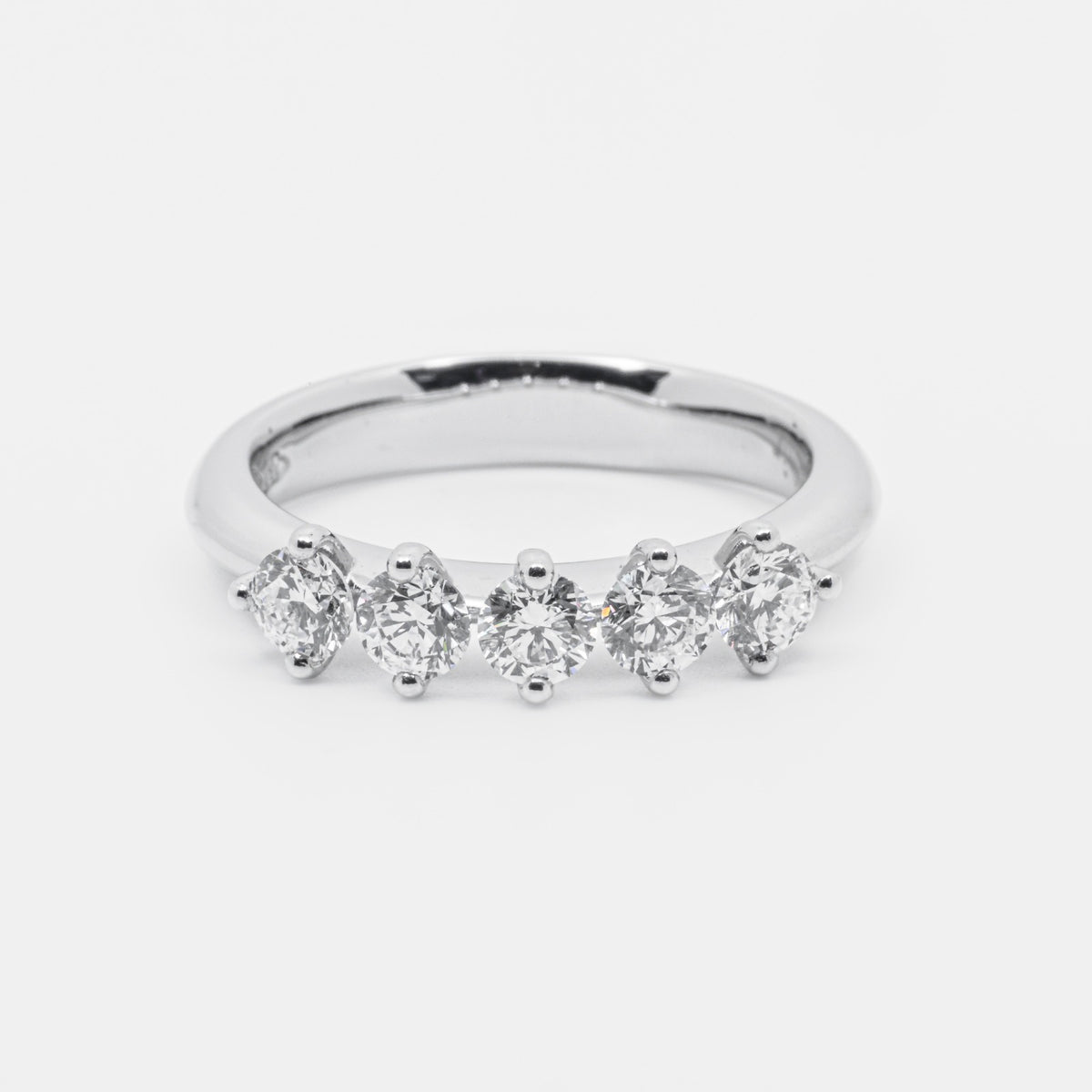 5 stone ring in Platinum and 0.95 kt brilliant cut diamonds